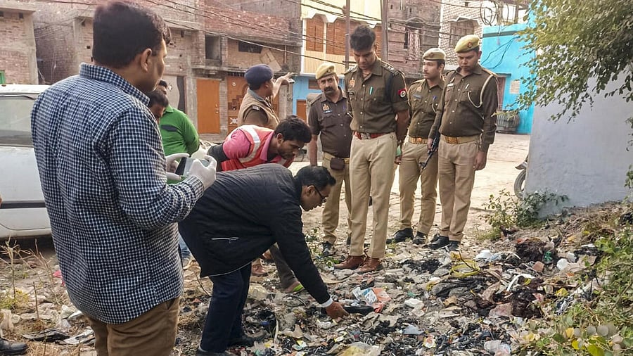<div class="paragraphs"><p>Police and forensic science experts inspect a site of the recent violence as part of investigations, in Sambhal district.</p></div>