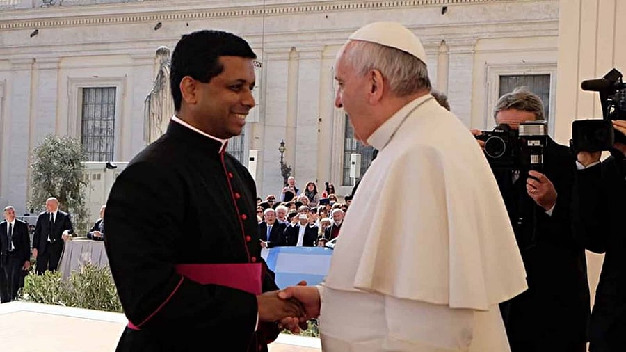 <div class="paragraphs"><p>A file image of George Jacob Koovakad with Pope Francis. </p></div>