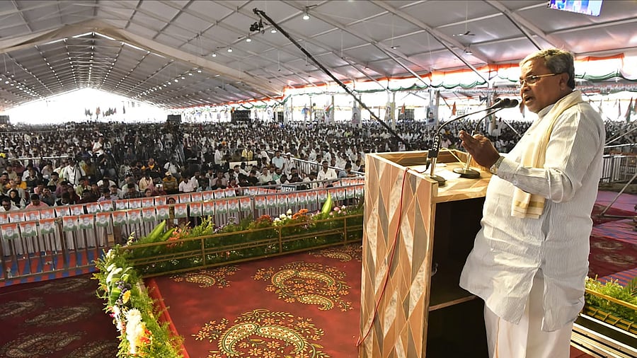 <div class="paragraphs"><p>Chief Minister Siddaramaiah speaks at the Janakalyan Samavesha of Congress at S M Krishna Nagar in Hassan on Thursday. </p></div>