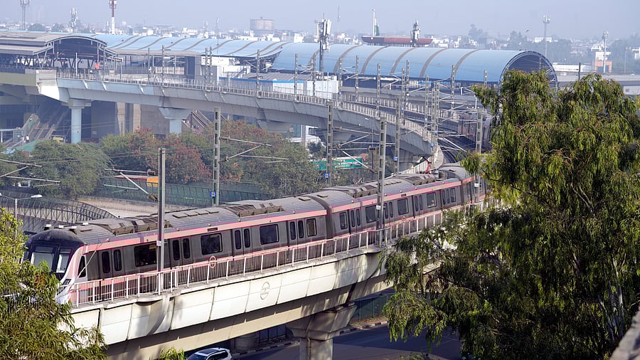 <div class="paragraphs"><p> A metro train in Delhi.</p></div>