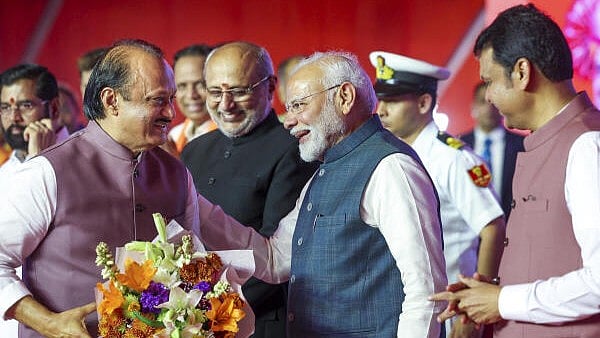 <div class="paragraphs"><p>Prime Minister Narendra Modi and Maharashtra Governor CP Radhakrishnan, background center, with the newly-sworn Maharashtra Chief Minister Devendra Fadnavis, right, and Deputy Chief Ministers Ajit Pawar, foreground left, and Eknath Shinde, background left, during the swearing-in ceremony, in Mumbai, Thursday, Dec. 5, 2024.</p></div>