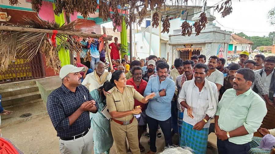 <div class="paragraphs"><p>Muzrai and other department officials speak to villagers at Tirumala temple in Narasipura village.</p><p></p></div>