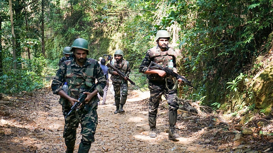 <div class="paragraphs"><p> Security personnel during a combing operation in Kabbinale forest area, in Udupi district, Karnataka. </p></div>