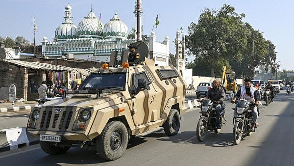 <div class="paragraphs"><p>Security personnel patrol in a sensitive area in view of 'Jummah' prayers and the Babri Masjid demolition anniversary, in Ayodhya on Friday</p></div>