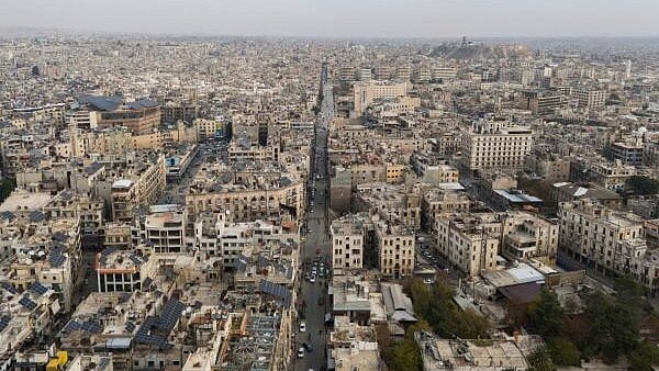 <div class="paragraphs"><p>A drone view shows buildings and the ancient citadel, after rebels took the main northern city of Aleppo and have since pushed south from their enclave northwest of the country, in Aleppo, Syria, December 4, 2024.</p></div>
