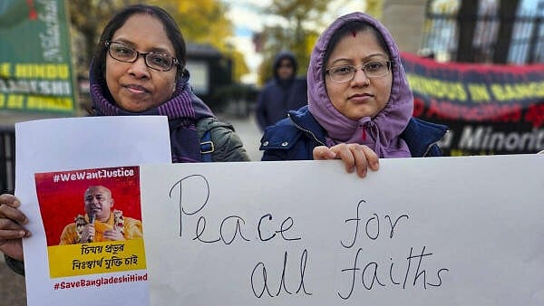 <div class="paragraphs"><p>Washington: Members of the Hindu community from Bangladesh stage a rally at the White House demanding release of Chinmaya Das and protection for the community.</p></div>