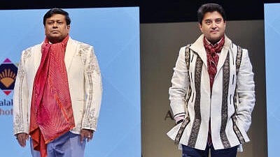<div class="paragraphs"><p>Union Minister of Telecommunications and DoNER Jyotiraditya Scindia walks the ramp during a fashion show organised on the North-Eastern region of India at the Ashtalakshmi Mahotsav at Bharat Mandapam, in New Delhi, Dec. 7, 2024.</p></div>