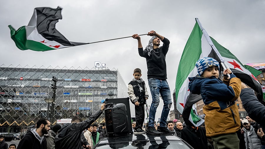 <div class="paragraphs"><p>Syrian Association in Denmark demonstrates, after Syrian rebels announced that they have ousted Syria's Bashar al-Assad, at City Hall Square, in Copenhagen, Denmark December 8, 2024.     </p></div>