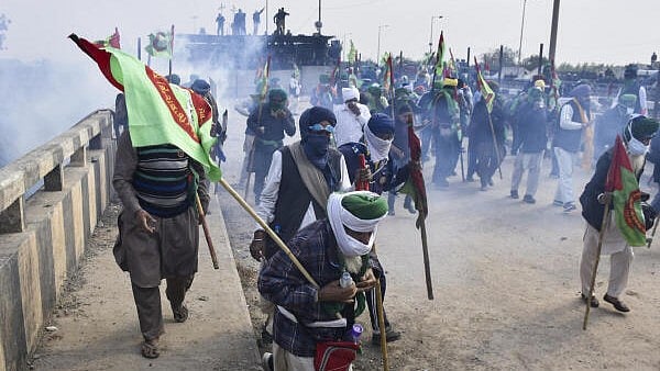 <div class="paragraphs"><p>Tear gas being used to disperse protesting farmers at Shambhu Border during their foot march towards Delhi, in Patiala district, Sunday, Dec. 8, 2024. A group of 101 farmers resumed their foot march to Delhi shortly after 12 noon on Sunday from the Shambhu protest site on the Punjab-Haryana border to press the Centre for various demands, including a legal guarantee for Minimum Support Price (MSP).</p></div>