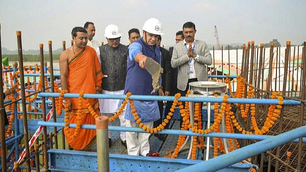 <div class="paragraphs"><p>Chief Minister of Assam Himanta Biswa Sarma during the ground breaking ceremony for 4-Lane Extradosed PSC bridge at Sualkuchi, in Kamrup district, Assam, Sunday, Dec. 8, 2024.</p></div>