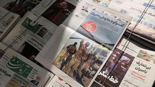 <div class="paragraphs"><p>A newspaper with a picture of Syrian rebel fighters is seen at a newspaper stand in Tehran, Iran December 8, 2024. </p></div>