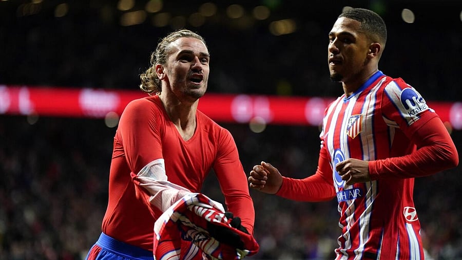 <div class="paragraphs"><p>Atletico Madrid's Antoine Griezmann celebrates scoring their fourth goal</p></div>