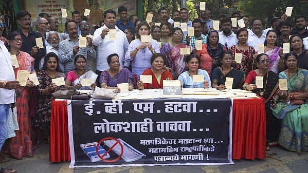 <div class="paragraphs"><p> NCP (SP) workers show the letters written to the President, containing signatures of citizens, requesting that the next elections be held using the ballot paper, during a protest over the EVM controversy, in Thane, Maharashtra.</p></div>