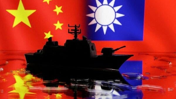 <div class="paragraphs"><p> Illustration shows Chinese and Taiwanese flags.</p></div>