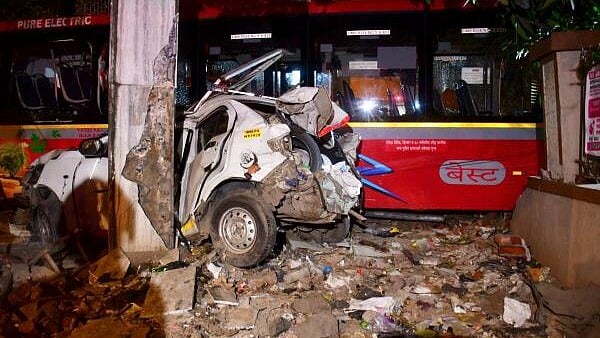 <div class="paragraphs"><p>Wreckage of a car after a speeding BEST bus collided with several vehicles on a road at Kurla in Mumbai.</p></div>