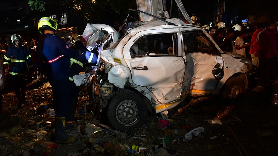 <div class="paragraphs"><p> A damaged car being checked at the site after a Brihanmumbai Electric Supply and Transport (BEST) undertaking's bus rammed into pedestrians as well as vehicles on a road at Kurla, in Mumbai, Monday, Dec. 9, 2024. </p></div>