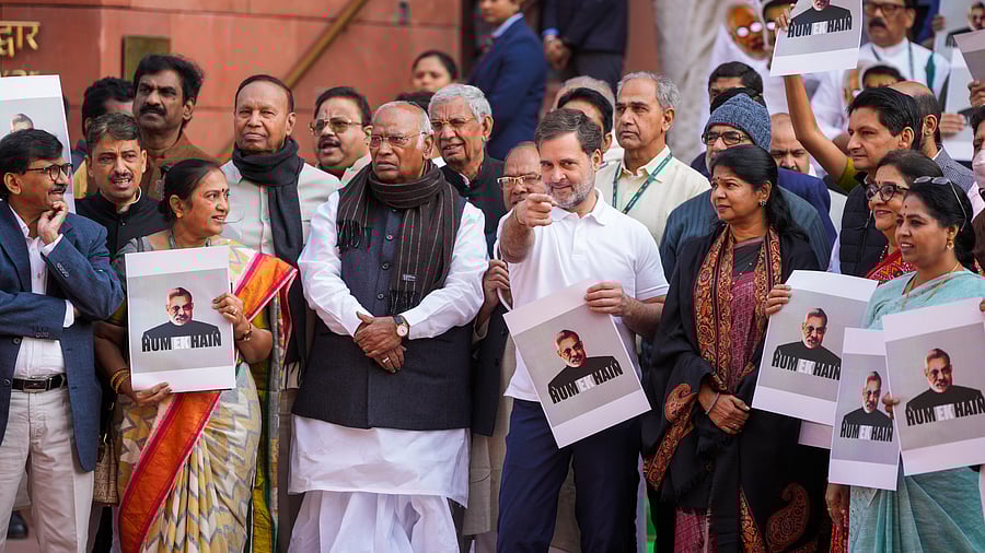 <div class="paragraphs"><p>LoP in the Rajya Sabha Mallikarjun Kharge with LoP in the Lok Sabha Rahul Gandhi and other I.N.D.I.A. bloc MPs stages a protest over the Adani issue during the Winter session of Parliament, in New Delhi, Monday, Dec. 9, 2024.</p></div>