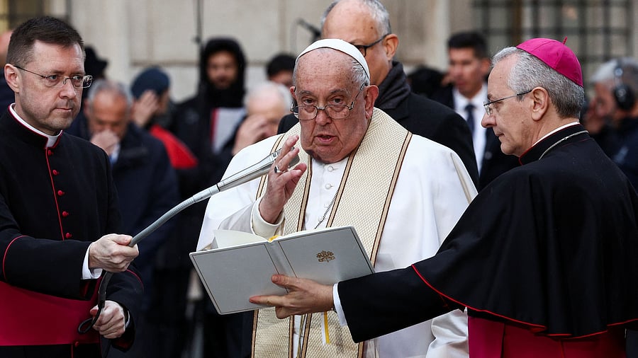 <div class="paragraphs"><p>Pope Francis, with a large bruise on his chin, gestures during the Immaculate Conception celebration prayer near the Spanish Steps in Rome, Italy.&nbsp;</p></div>