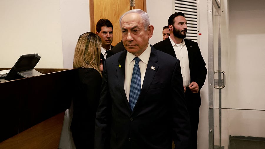 <div class="paragraphs"><p>Israeli Prime Minister Benjamin Netanyahu enters the district court in Tel Aviv at the start of his hearing on corruption charges on December 10, 2024. </p></div>
