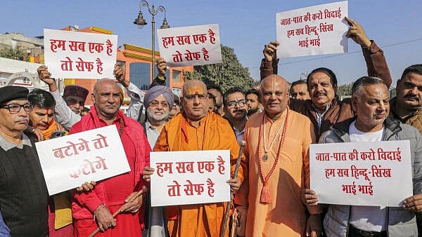 <div class="paragraphs"><p>Members of Shri Durgiana Committee take part in a protest against the atrocities on religious minorities in Bangladesh, in Amritsar.</p></div>
