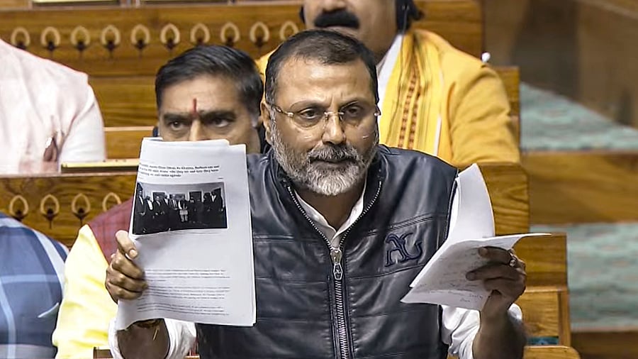 <div class="paragraphs"><p> BJP MP Nishikant Dubey speaks in the Lok Sabha during the Winter session of Parliament, in New Delhi.</p></div>