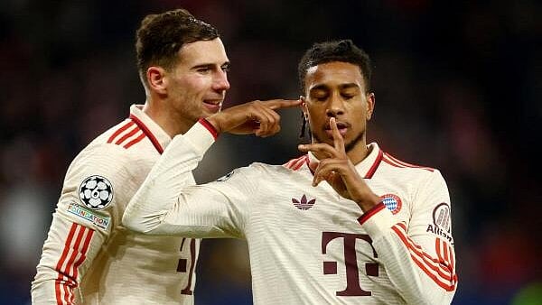 <div class="paragraphs"><p>Bayern Munich's Michael Olise celebrates scoring their third goal with Leon Goretzka</p></div>