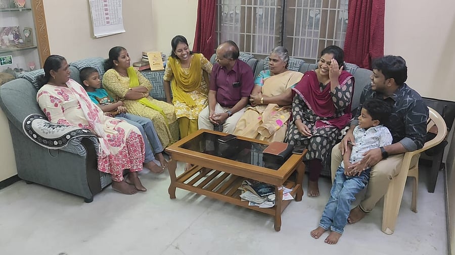 <div class="paragraphs"><p>Image showing the businessman reuinting with the family he stole from.</p></div>