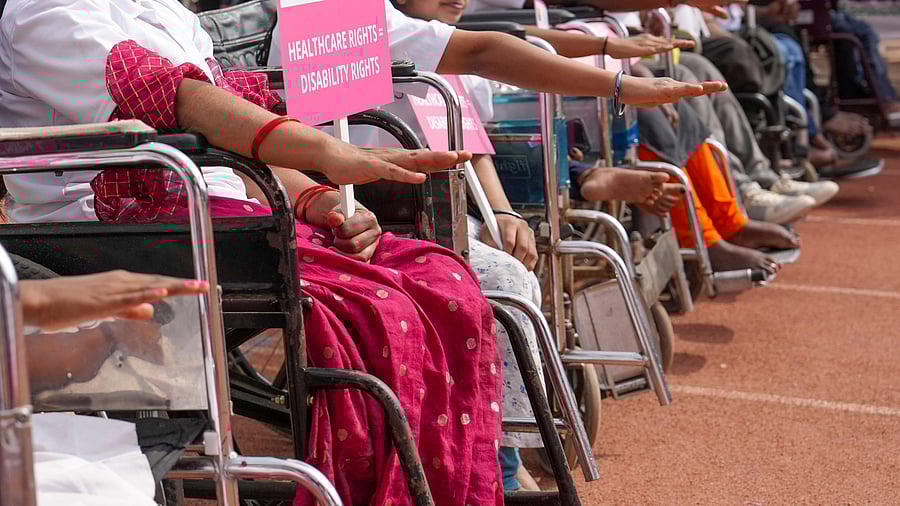 <div class="paragraphs"><p>File photo of people with disability take oath during a walkathon to create awareness in Bengaluru (Representative image)</p></div>
