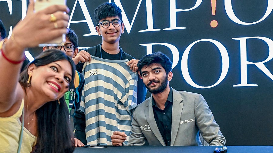 <div class="paragraphs"><p>Fans clamour for a selfie with the newly-crowned world chess champion D Gukesh in Singapore on Friday.  </p></div>
