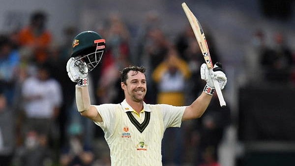 <div class="paragraphs"><p>Australia's Travis Head celebrates scoring a century</p></div>