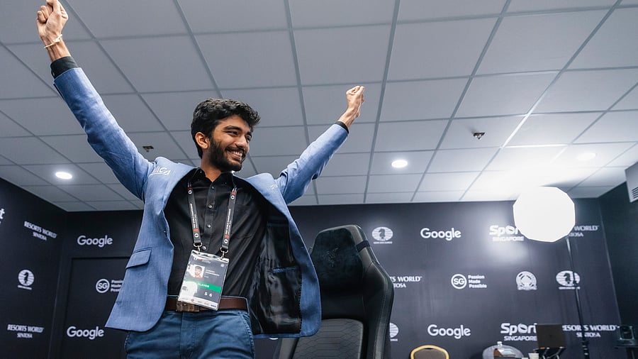 <div class="paragraphs"><p>India’s D Gukesh (right) celebrates his win while title-holder China’s Ding Liren is distraught at the end of Game 14 of the FIDE World Chess Championship in Singapore on Thursday. </p></div>