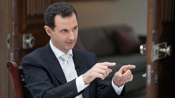 <div class="paragraphs"><p>Syria's President Bashar al Assad gestures. </p></div>