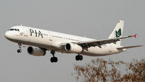 <div class="paragraphs"><p>A Pakistan International Airlines (PIA) plane prepares to land at Islamabad airport in Islamabad. File Photo</p></div>