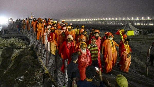 <div class="paragraphs"><p>Naga sadhus of Juna Akhara take part in procession during the first 'royal entry' (Chavni Pravesh) for the Maha Kumbh Mela 2025 festival, in Prayagraj, Saturday, December 14, 2024.</p></div>