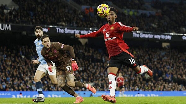 <div class="paragraphs"><p>Football - Premier League - Manchester City v Manchester United - Etihad Stadium, Manchester, Britain - December 15, 2024 Manchester United's Amad Diallo scores their second goal.</p></div>