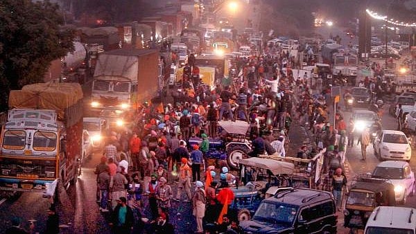 <div class="paragraphs"><p>Farmers return to their homes after their year-long agitation against the contentious farm reform laws, in Patiala, Saturday, Dec. 11, 2021. Farmers have called off their agitation after receiving a formal letter from the Centre on Thursday agreeing to their pending demands.</p></div>