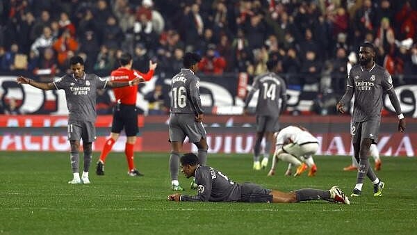 <div class="paragraphs"><p>LaLiga - Rayo Vallecano v Real Madrid - Campo de Futbol de Vallecas, Madrid, Spain - December 14, 2024 Real Madrid's Jude Bellingham lies on the ground after the match.</p></div>