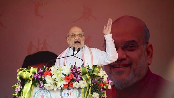 <div class="paragraphs"><p>Union Home Minister Amit Shah addresses the gathering during the closing ceremony of ‘Bastar Olympics’ at Jagdalpur, in Bastar district, Chhattisgarh on Sunday</p></div>