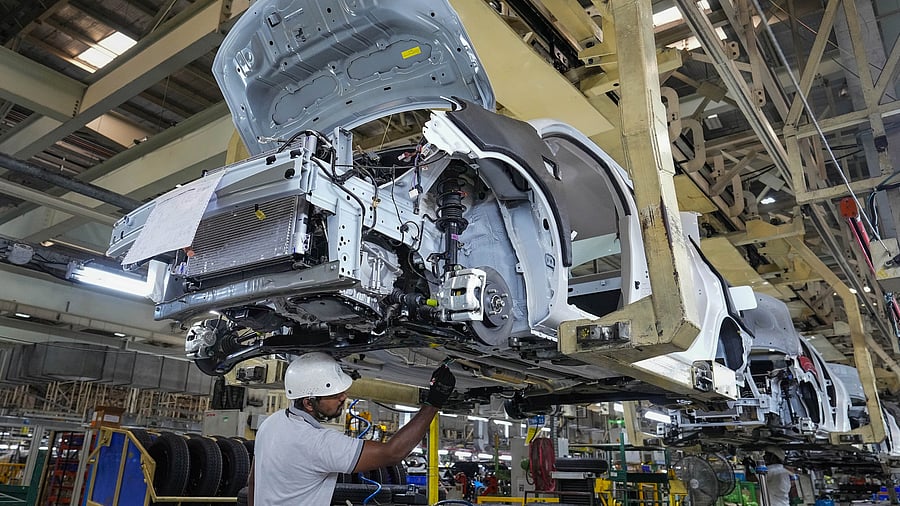 <div class="paragraphs"><p>Employees work in an assembly line at the joint manufacturing facility of Renault-Nissan Automotive India Pvt Ltd, near Chennai.</p></div>