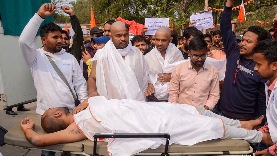 <div class="paragraphs"><p>File Photo: A student who fainted while taking part in a protest against the alleged mismanagement of Jharkhand Staff Selection Commission (JSSC) over paper leak issue, being taken for treatment, in Ranchi.</p></div>