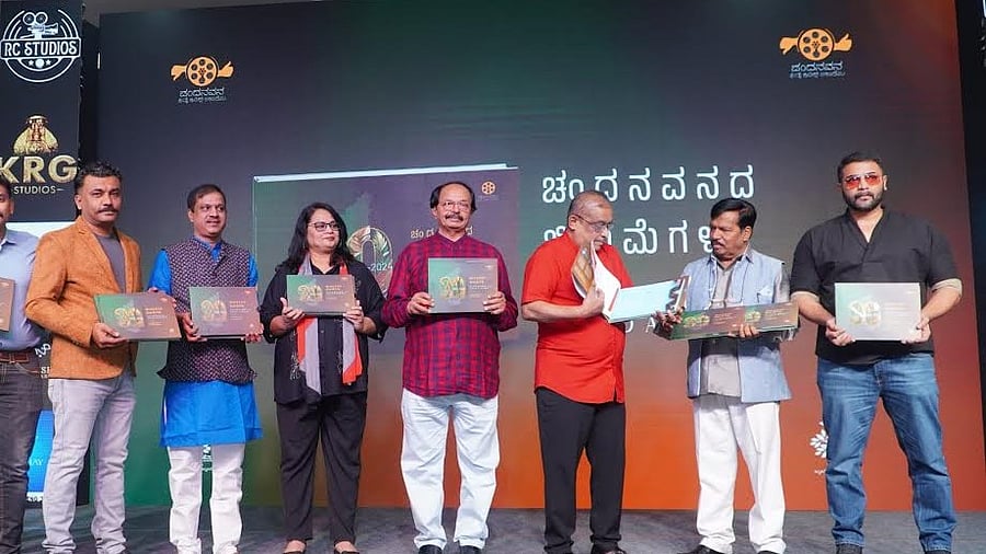 <div class="paragraphs"><p>Group photo of book launch; Left to right: Authors S Shyam Prasad and Sharanu Hullur, journalist Ayesha Khanum, filmmaker Nagathihalli Chandrashekhar, music director Hamsalekha, filmmaker T S Nagabharana and actor Srii Murali. </p></div>