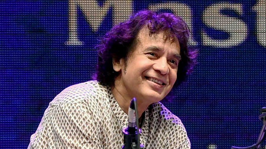 <div class="paragraphs"><p> Tabla maestro Ustad Zakir </p></div>