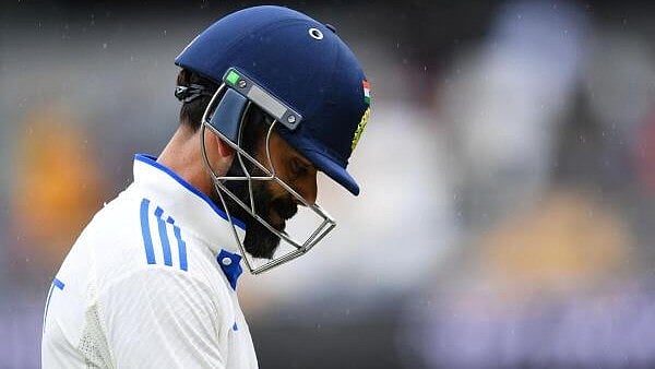 <div class="paragraphs"><p>Third Test - Australia v India - Brisbane Cricket Ground, Brisbane, Australia - December 16, 2024 India's Virat Kohli looks dejected and walks back to the pavilion after losing his wicket, caught out by Australia's Alex Carey off the bowling of Josh Hazlewood.</p></div>