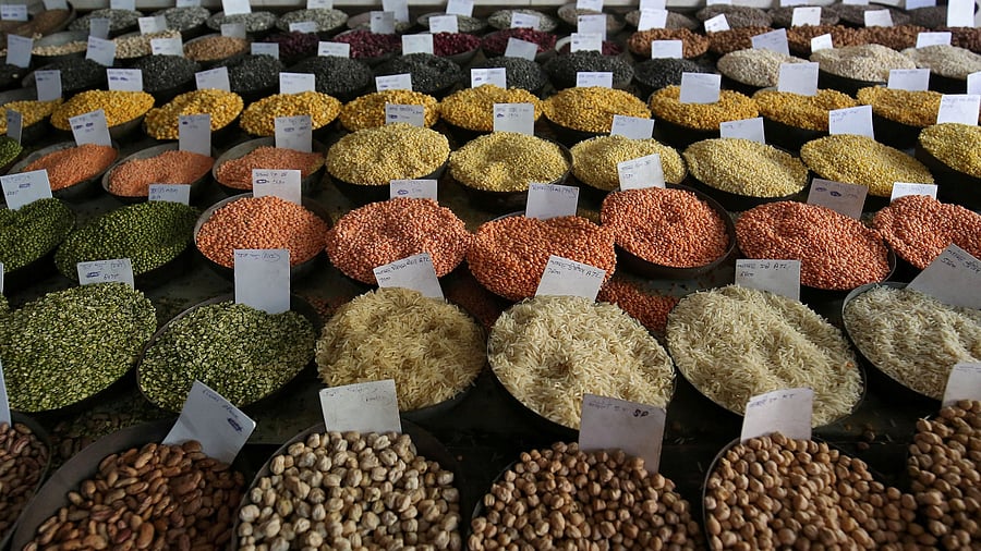 <div class="paragraphs"><p>Price tags are seen on the samples of rice and lentils that are kept on display for sale at a wholesale market in the old quarters of Delhi.</p></div>