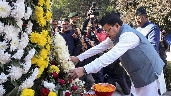 <div class="paragraphs"><p>Uttarakhand Chief Minister Pushkar Singh Dhami pays tribute to martyrs of 1971 Indo-Pakistan war on the occasion of Vijay Diwas, in Dehradun, Monday.&nbsp;</p></div>