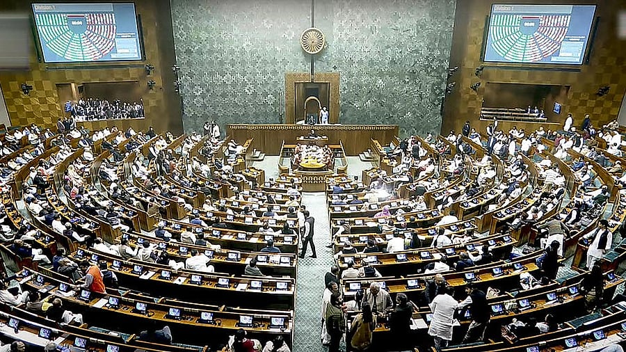 <div class="paragraphs"><p>Members vote after two Bills were introduced in Lok Sabha on Tuesday, December 17. </p></div>