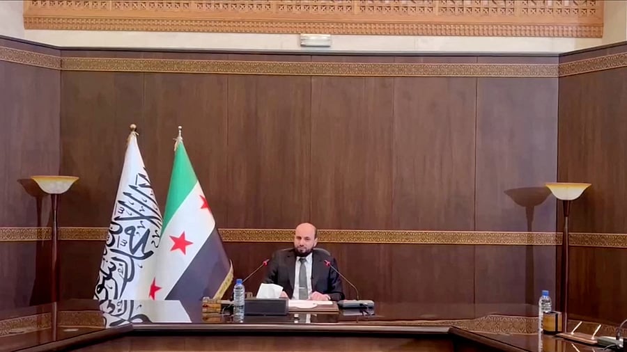 <div class="paragraphs"><p>Syrian caretaker Prime Minister Mohamed al-Bashir</p></div>