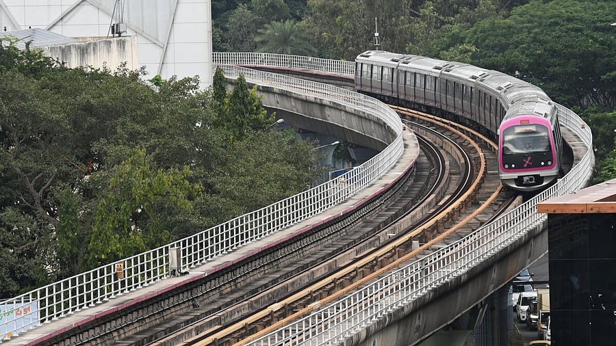 <div class="paragraphs"><p>A view of a metro train passing through the Purple Line.</p></div>