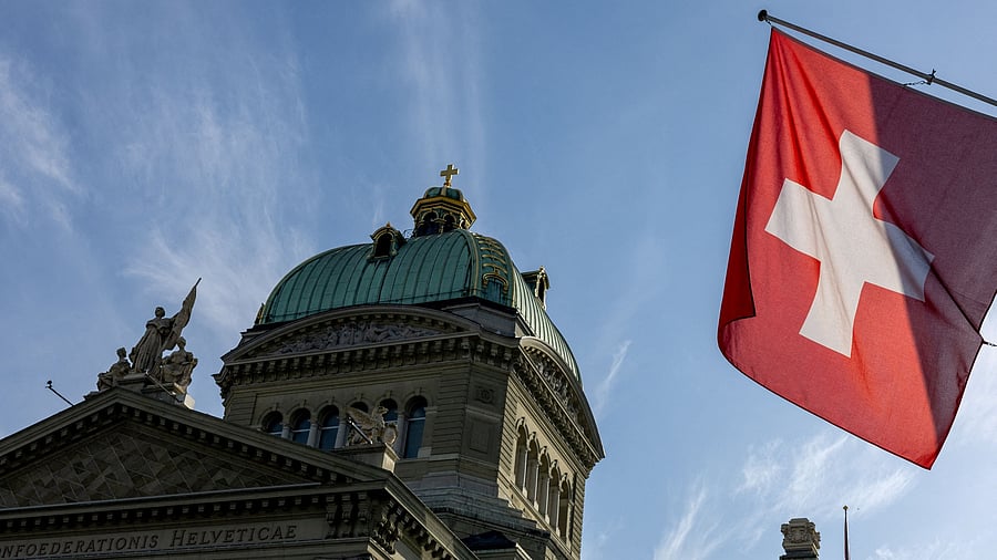 <div class="paragraphs"><p>FILE PHOTO: A Swiss flag is seen on the Swiss Parliament building  in Bern, Switzerland.</p></div>