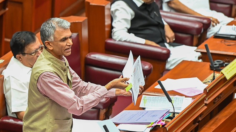 <div class="paragraphs"><p>Karnataka Revenue Minister Krishna Byre Gowda speaks during the session in the Legislative Council at Suvarna Vidhana Soudha in Belagavi on Wednesday. Home Minister G Parameshwara is seen.&nbsp;</p></div>